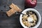 Bowl with yogurt, muesli and honey on floor