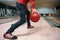 Bowler makes throw, closeup view on hand with ball