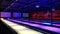 bowling alley with neon lights in blue and red and white lanes