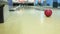 Bowling ball rolls on the floor