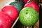 Bowling balls red green closeup row