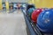 Bowling balls return machine, alley background