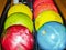 Bowling: multi-colored bowling balls on a ball-feeding machine