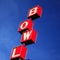 Bowling rink sign red blue sky