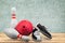 Bowling shoes and ball on background