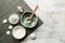 Bowls with cosmetic clays on light table