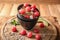 Bowls with delicious watermelon salad on wooden board