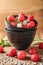 Bowls with delicious watermelon salad on wooden board