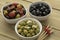Bowls with different olives