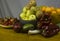 Bowls of fresh fruits on wooden table