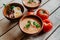 Bowls with gazpacho, parsley, egg, and Iberian ham