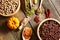 Bowls and spoons of various legumes