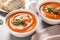 Bowls of tasty sweet potato soup served