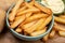 Bown with fresh cooked french fries potato chips with belgian mayonnaise sauce