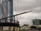 Bowsprit of a historical classic frigate ship in a modern tourist area