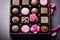 Box of artisan chocolates. Luxury handmade chocolates and a praline. Generative AI