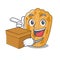 With box cake madeleine french isolated on mascot