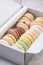 Box with Colorful Pastel Macaroons Cookies