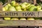 Box of free green apples with the dutch text for `Take one