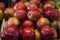 Box of fresh apples on wood desk