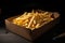box of freshly cut fries, ready to be seasoned and enjoyed