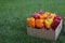 A box full of assorted and colorful bell peppers. Healthy Red, yellow and orange peppers ready to eat.