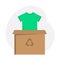 Box with a green t-shirt. Recycling clothing