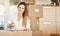 This box is heading for my new home. Cropped portrait of an attractive young woman sealing a box on moving day.