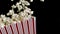 Box of popcorn in super slow motion falling
