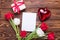 Box with present, heart, empty tag and bright red and white tul