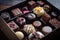 box of rich and decadent chocolates with variety of sweet treats