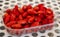 Box of ripe red wild strawberries for sale in small town Nemi, Castelli Romani, near Rome, Italy