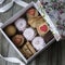 Box of sweets: cookies, marshmallow, meringue in a box on the table, cookies in the shape of a heart. a romantic gift for