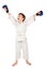 Boxer boy in white dress and blue boxing gloves