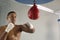 Boxer Hitting A Speed Bag In Gym