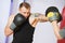 Boxer man at boxing training with punch mitts