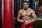 Boxer man training, workout. Muscular boxing fighter, naked torso abs