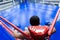 Boxer sitting in the corner of boxing ring