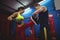 Boxers using focus mitts during training