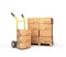 Boxes lie on a pallet near the handcart