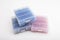 Boxes with silica gel absorbs moisture on white background , silica gel after used , pink