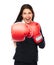 Boxing business woman punching