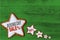 Boxing Day Sale cinnamon star on green wood concept