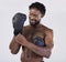 Boxing, fitness and black man happy about fight for sport training and workout in studio. Athlete boxer gloves for