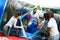 Boxing giant gloves on an inflatable trampoline in an amusement park