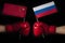 Boxing gloves with China and Russian flag. Russian Federation and the China confrontation and relations concept