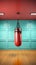 Boxing heavy bag hanging in a room. Concept of sports equipment, interior gym setup, boxing practice space, and athletic