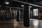 Boxing ring in the gym. Place for martial arts. Punching bags created by generative AI