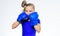 Boxing sport for female. Be strong. Girl child with blue gloves posing on white background. Sport upbringing. Upbringing