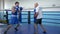 Boxing training, fighter guy fulfills blows with coach before championship on ring at sports club